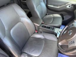 Nissan Navara 2.5 dCi Tekna Auto 4WD Euro 5 4dr at 7th